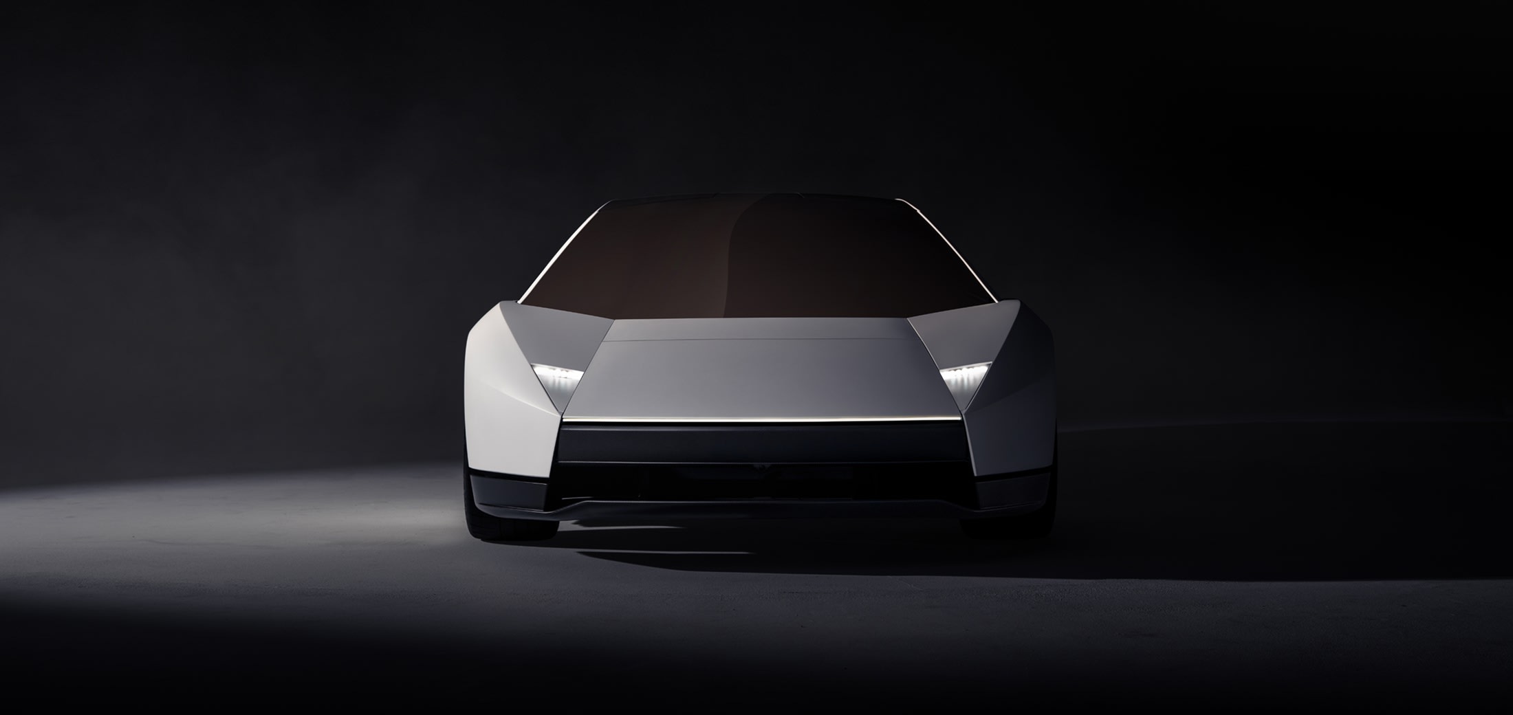 Vista frontale della nuova Tesla Roadster bianca con fari a scomparsa