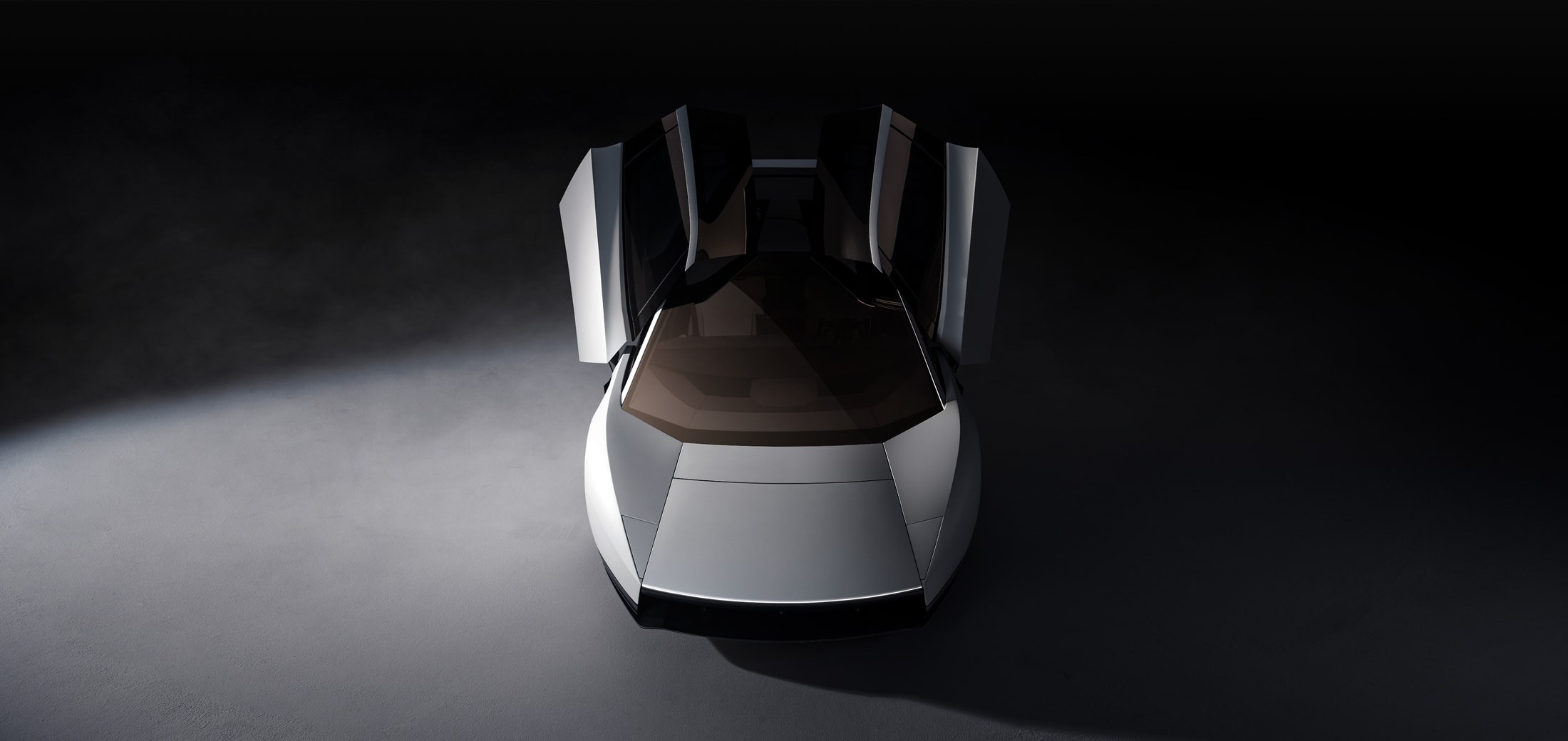 Tesla Roadster vista dall’alto con portiere aperte e vetratura dorata